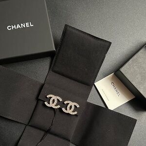 Authentic CHANEL Sparkling Silver Logo Studs